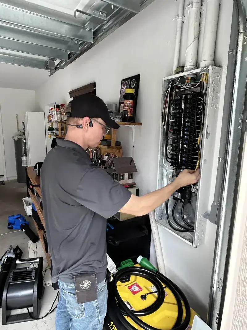 Electrical panel work in Lake Wales Kincaid Electric electrician working inside a home electrical panel