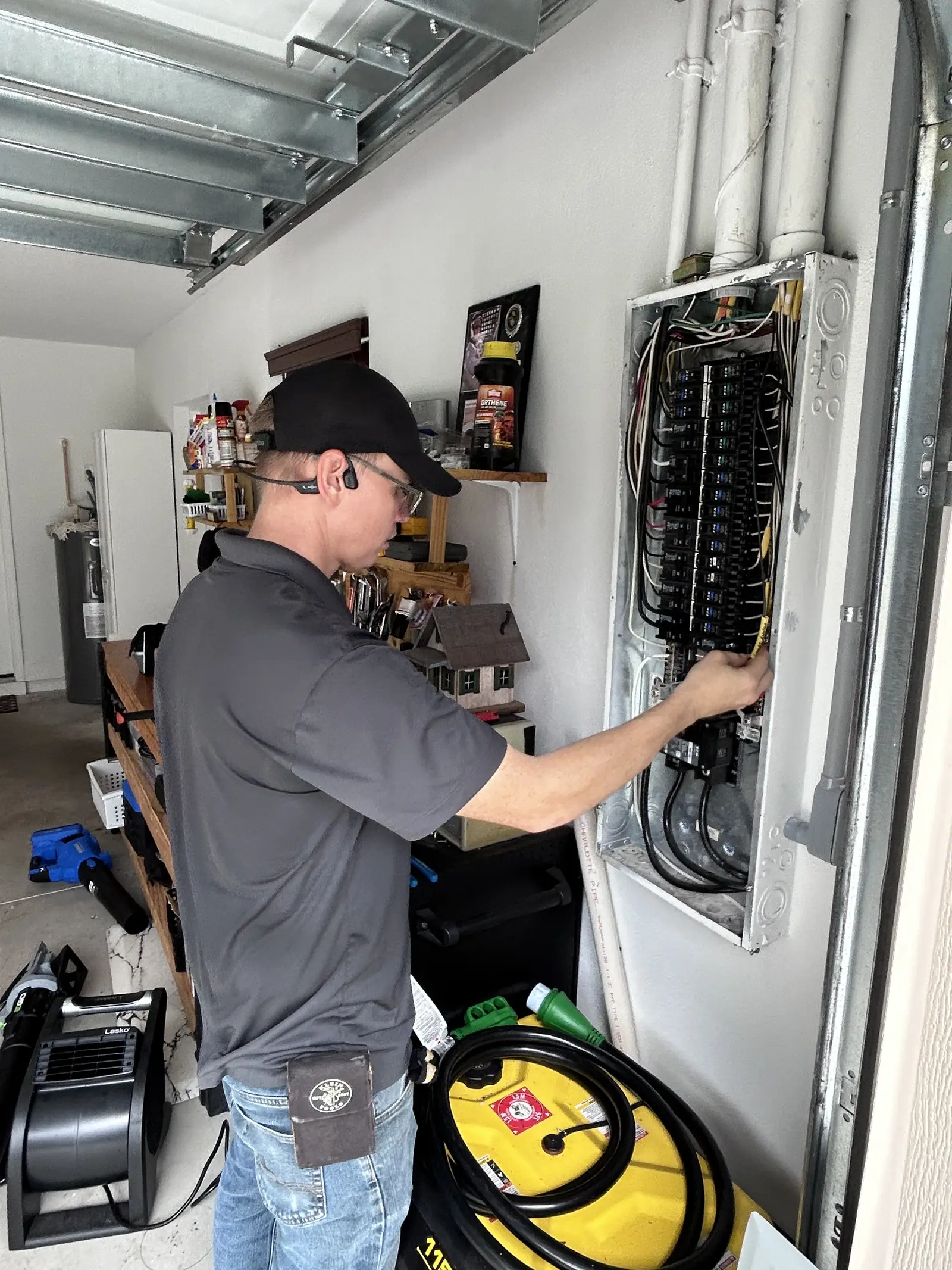 Electrical panel work in Lake Wales Kincaid Electric electrician working inside a home electrical panel